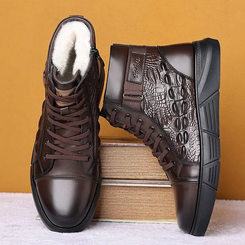 Black fur-integrated genuine leather winter boots with rubber soles and front laces on a white background.