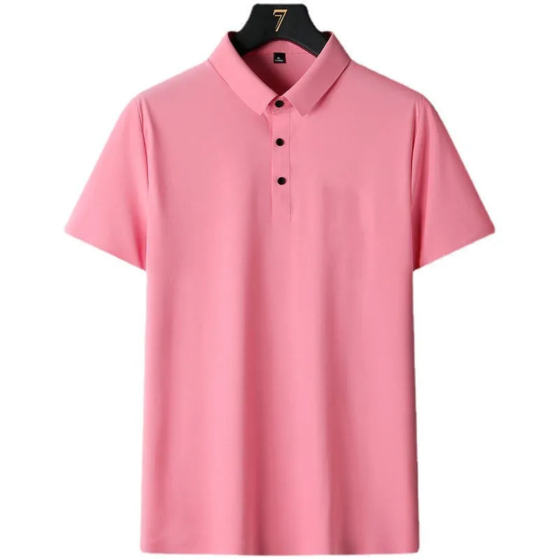 Man wearing a solid colour non-ironing business casual short sleeve shirt in a light blue shade.