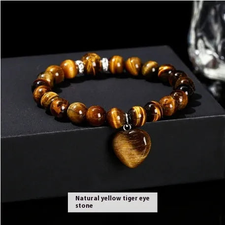 Handmade natural gemstone bracelet with tiger's eye, aventurine, and crystal beads in geometric round design