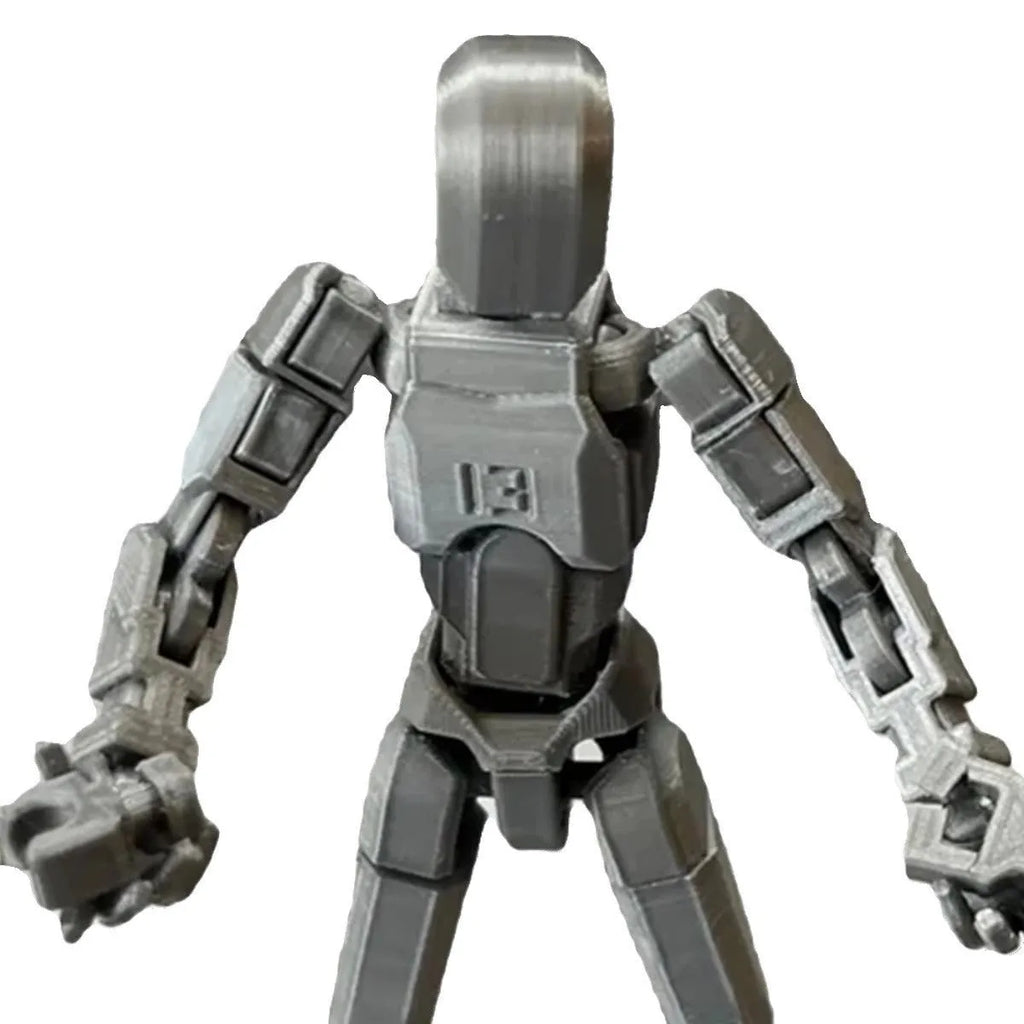 Unassembled 3D printed robot model kit with multi-jointed parts on a table