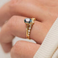 Gold plated women's ring with green zircon stones in flower design, available sizes 6-10