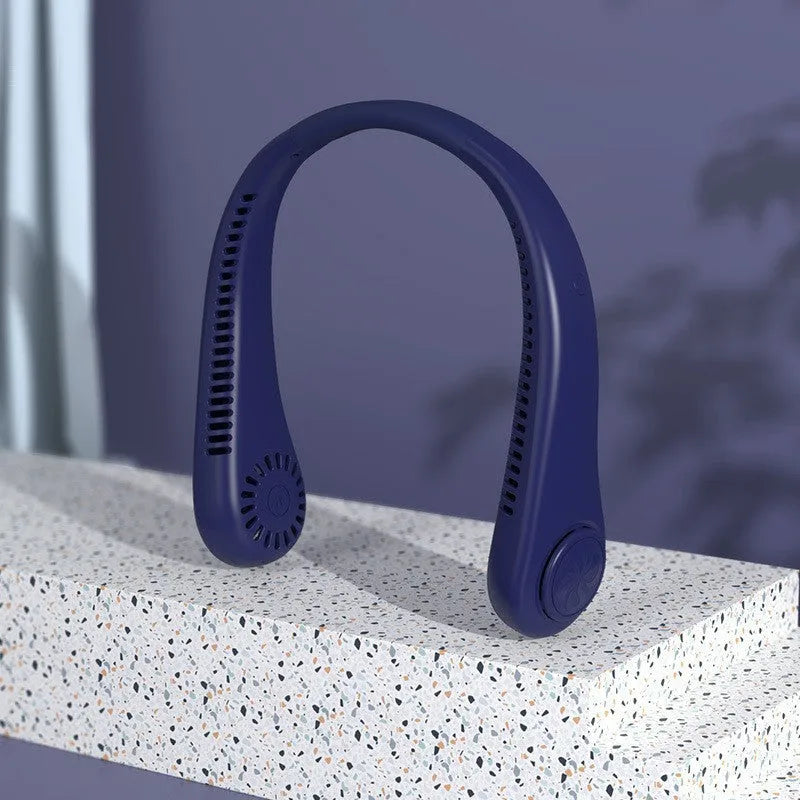 Pink portable bladeless neck fan hanging around a person's neck.