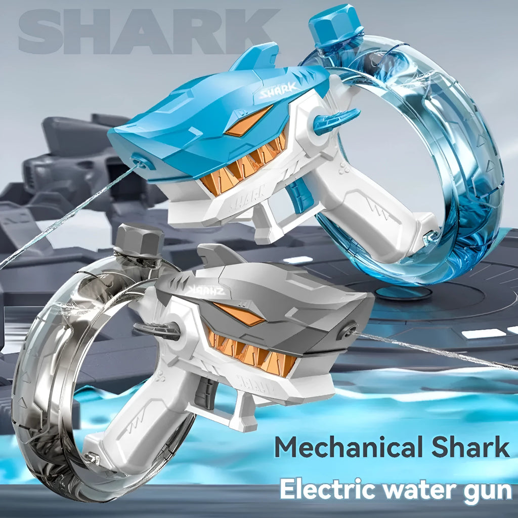 Blue Shark-shaped electric water gun toy with a large tank, placed on a sandy beach.