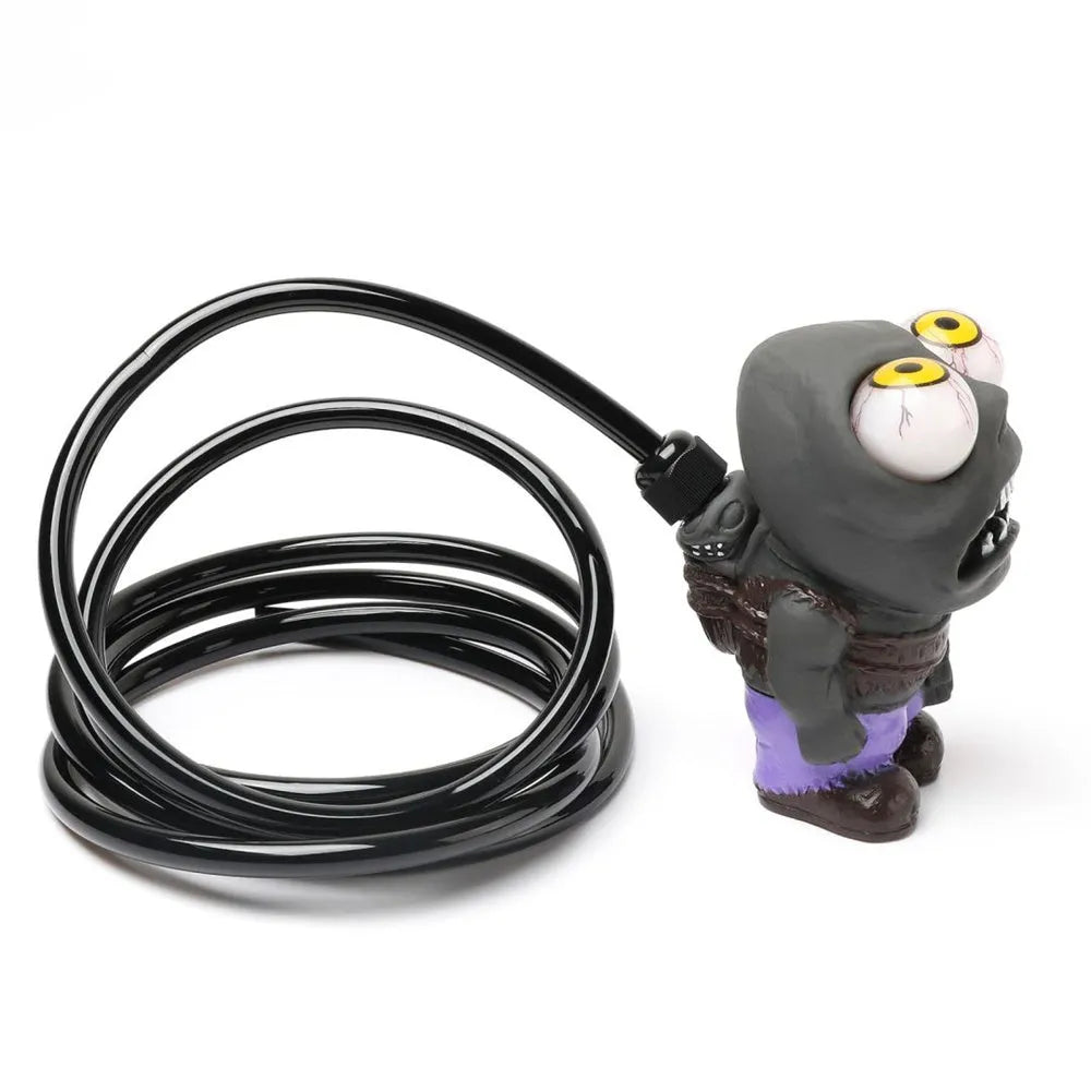 Turbo car explosive eye doll ornament and pressure valve kit with copper fittings on a white background.