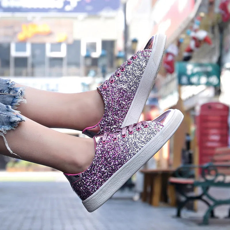 Women's black, pink, and gold sequinned casual lace-up shoes with a round toe and leather lining.