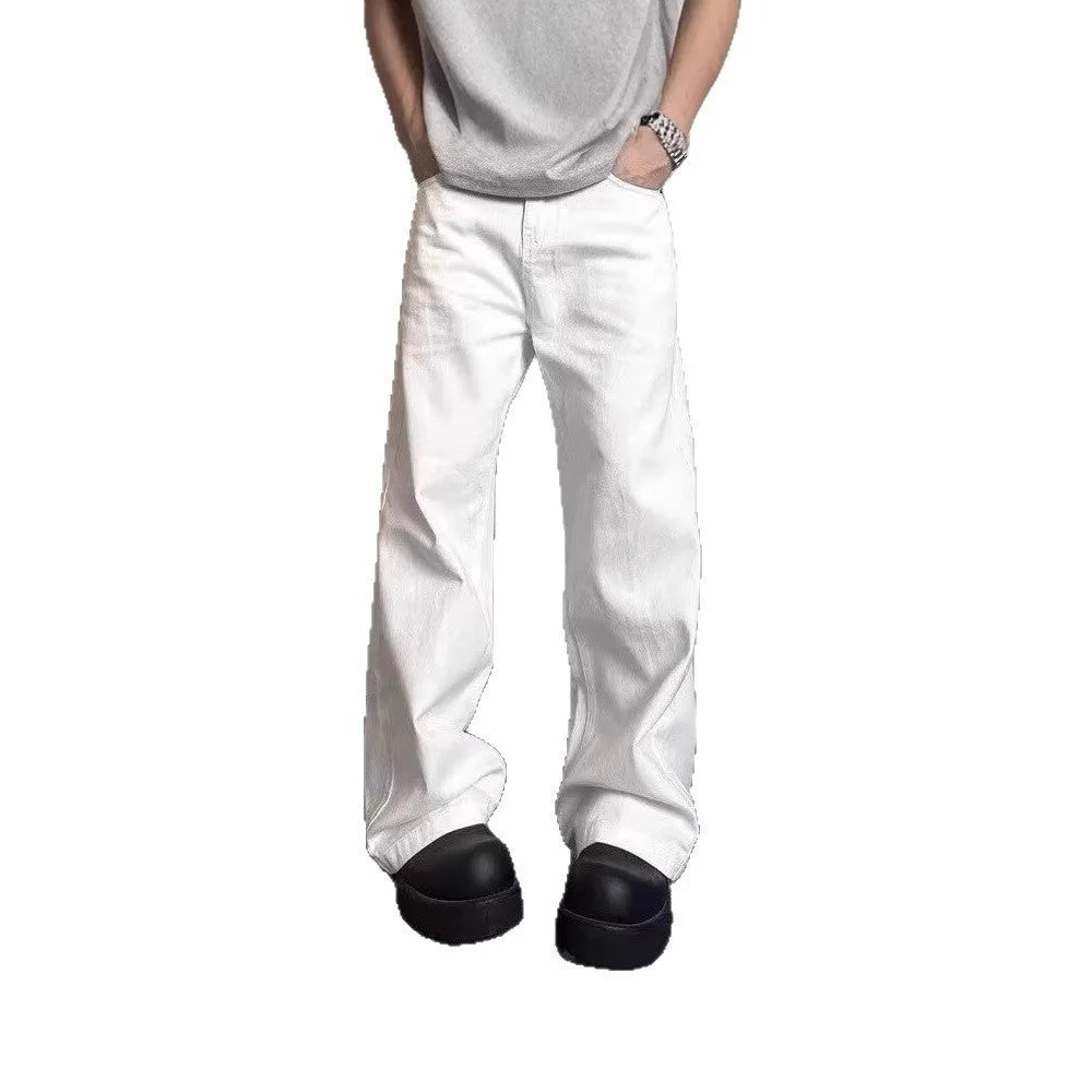 Men's straight leg white denim jeans with a mid waist and wide leg opening.