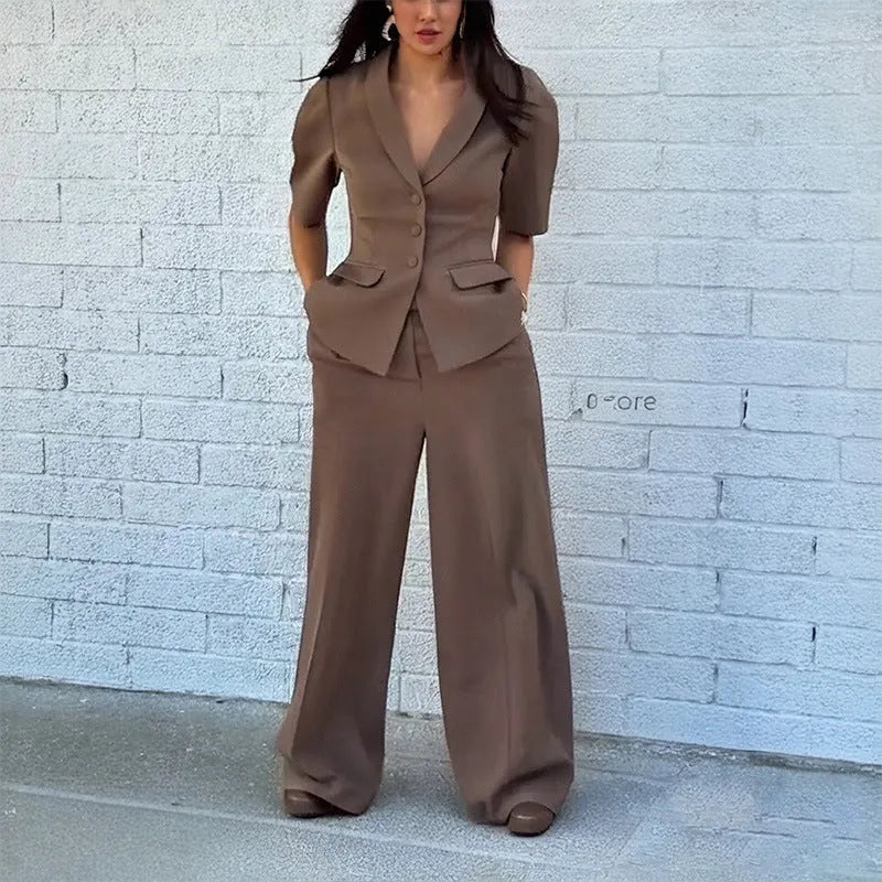 Brown polyester slim fit two-piece suit with long sleeves on a hanger