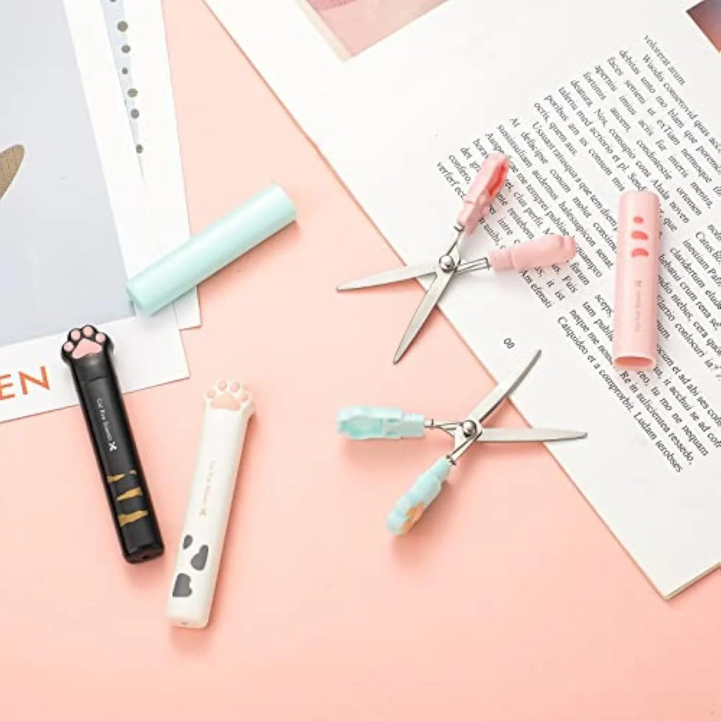 Cat paw mini folding scissors in four colours with stainless steel blades and decorative handles