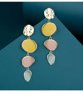 A pair of simple vintage alloy disc earrings with a Morandi three-colour oil drip finish.