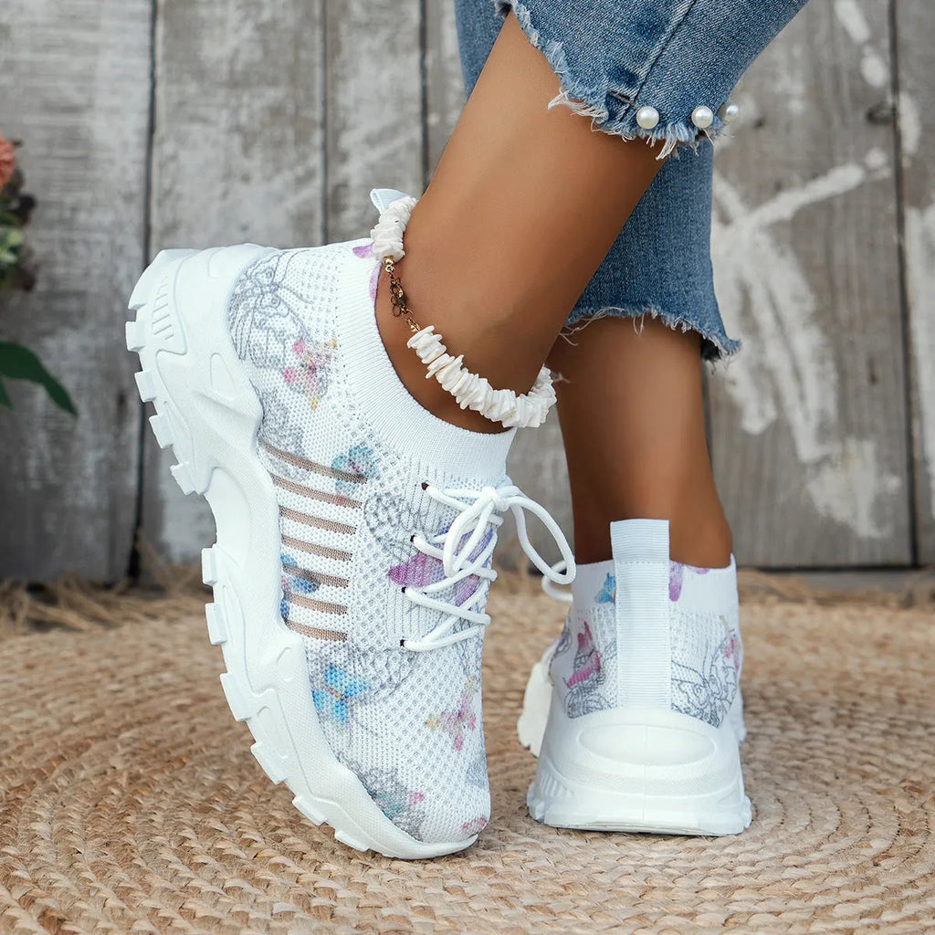 Butterfly print mesh sneakers for women in blue with flat heel, round toe, and front lace-up