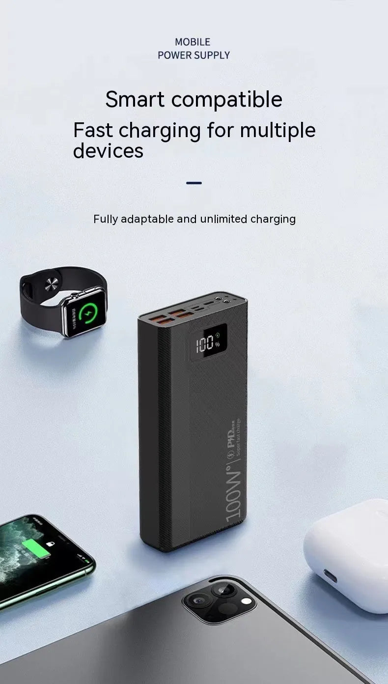 Large capacity black and white power bank with fast charging support showing size scale.