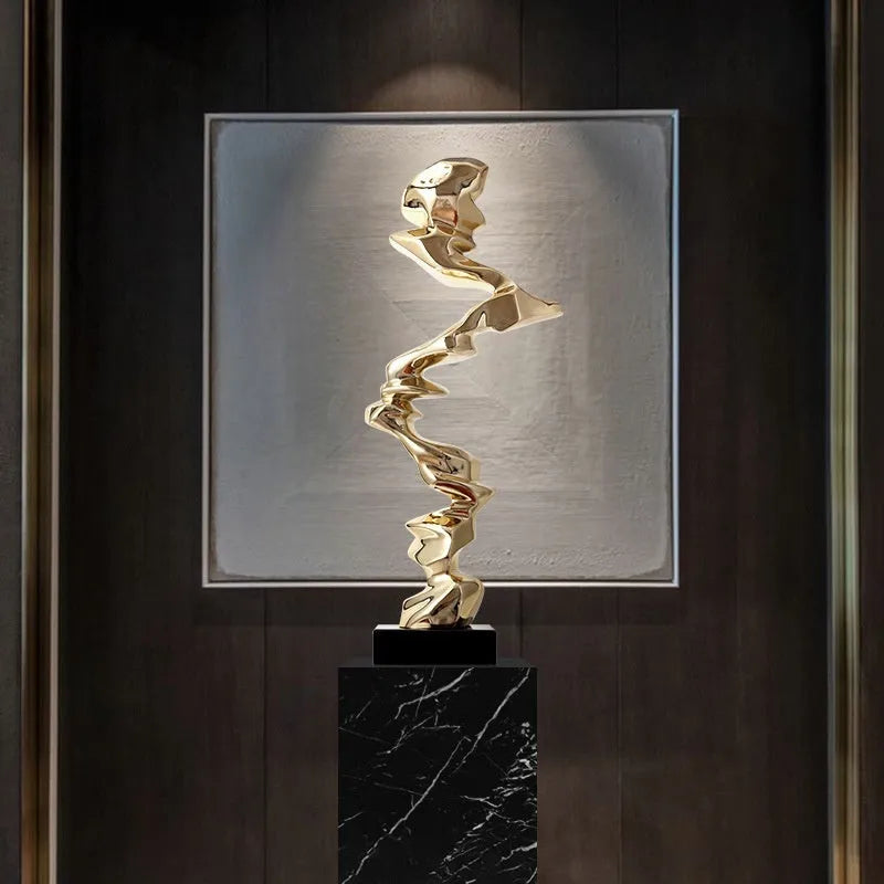 Abstract minimalist resin ornament in metallic colours for modern interior decoration