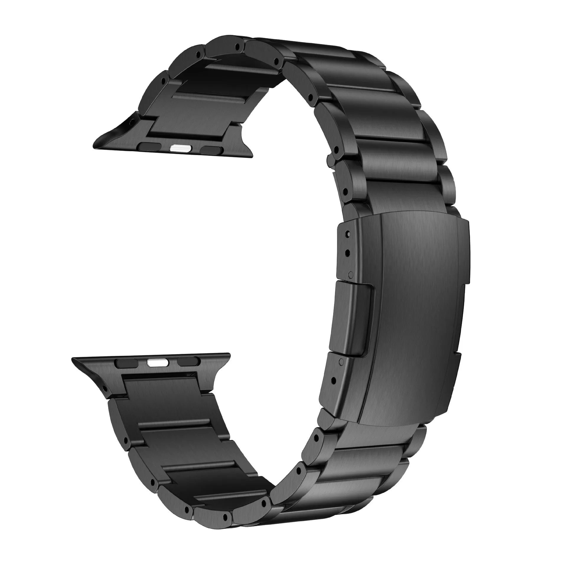Black titanium metal Apple Watch band with a folding buckle on a table