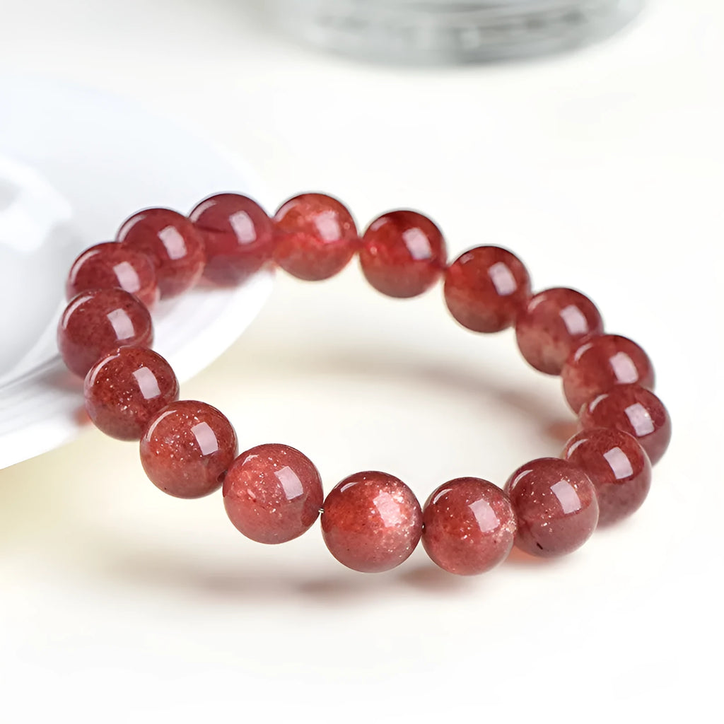 Natural starlight cherry red strawberry quartz bracelet with polished geometry-shaped crystal beads