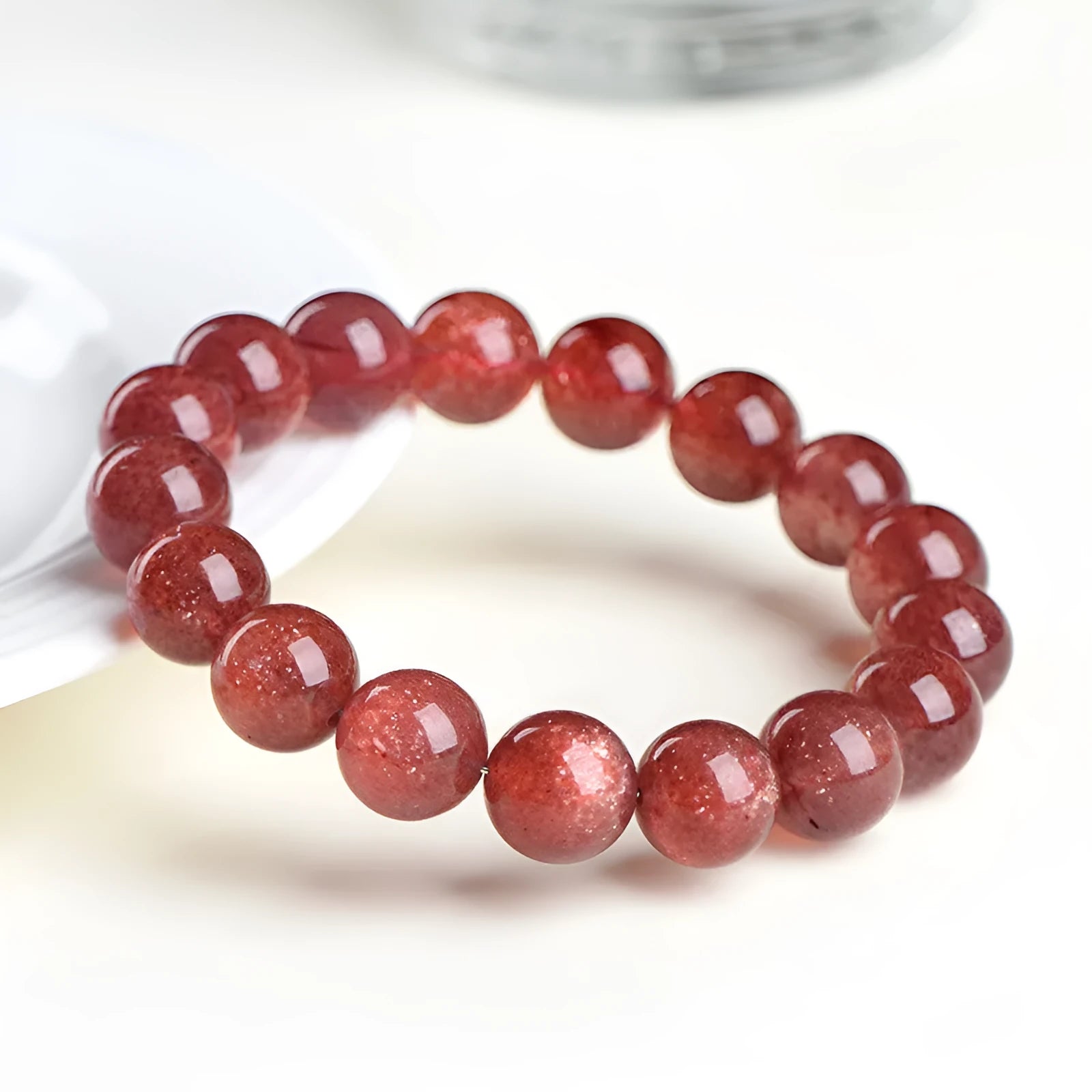Natural starlight cherry red strawberry quartz bracelet with polished geometry-shaped crystal beads