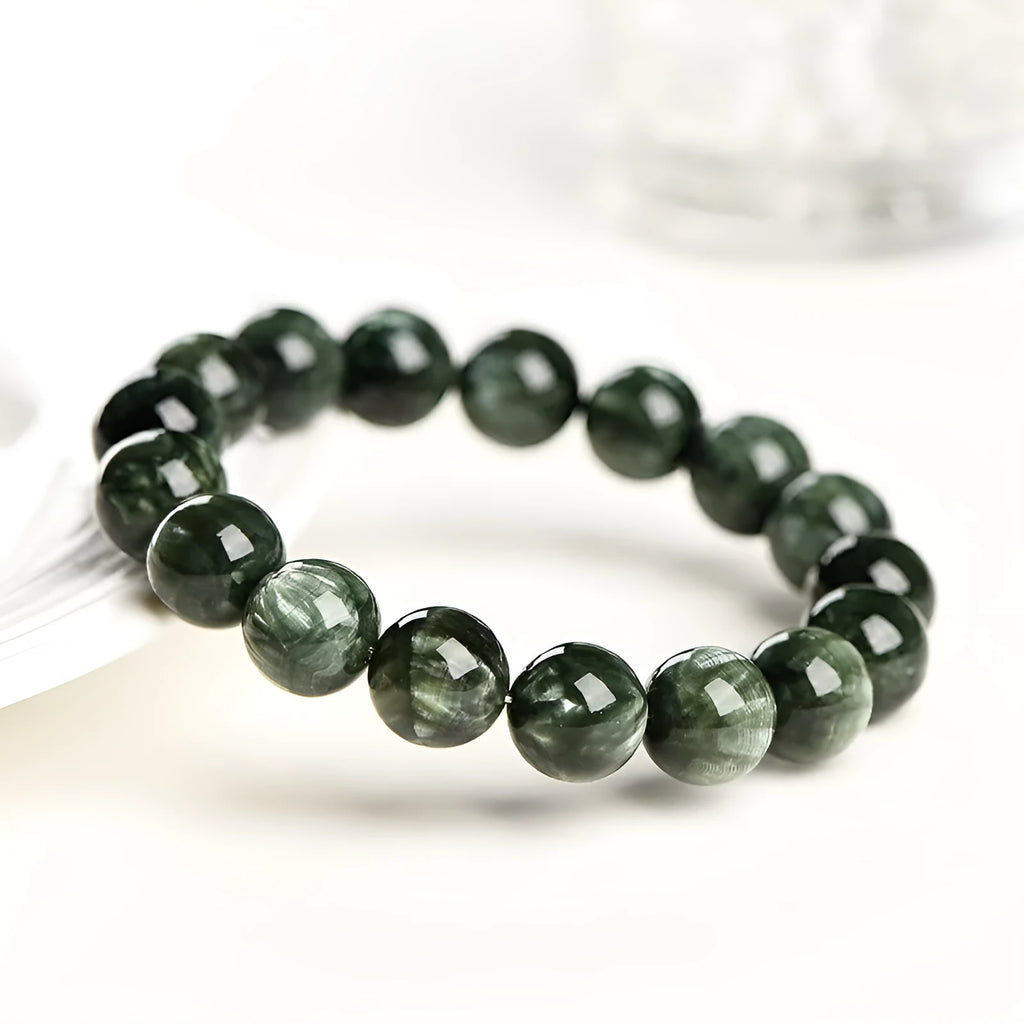 Unisex green dragon crystal bracelet with 8-9mm round beads and a Ruyi charm.