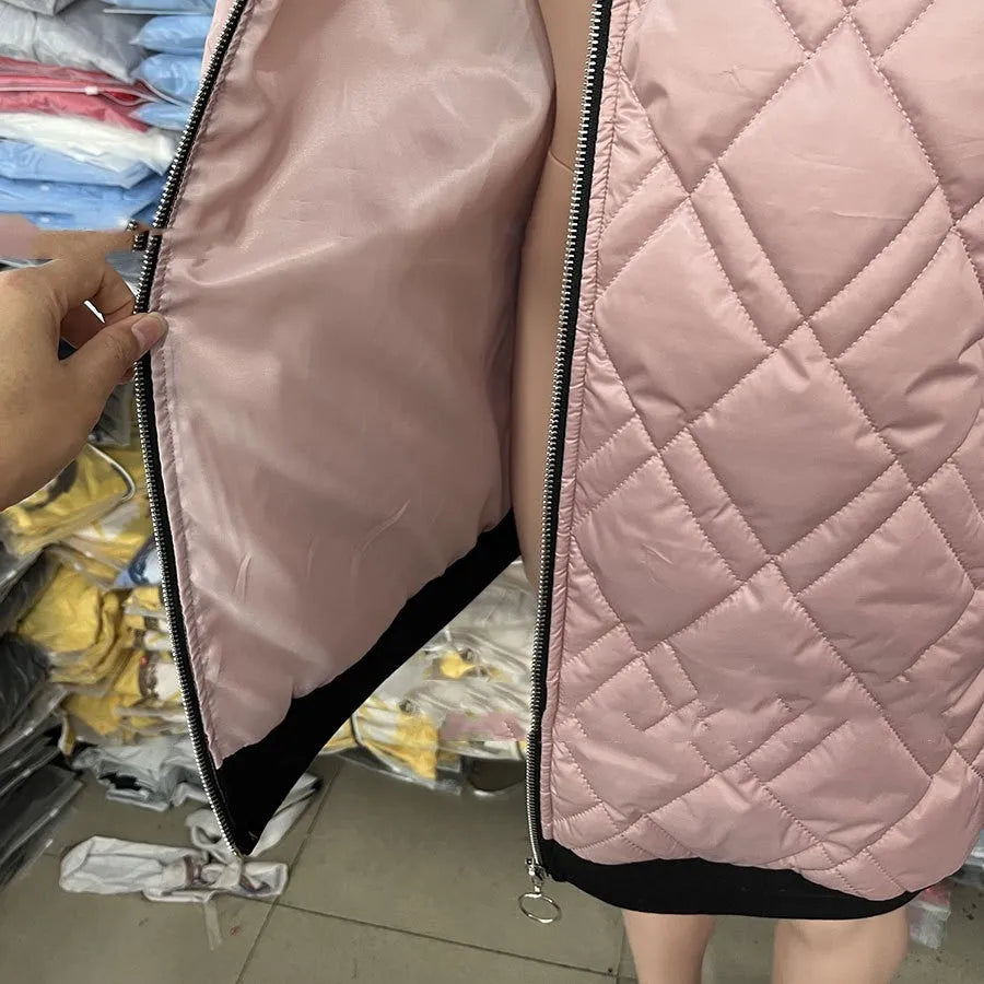 Women's casual hooded coat in pink and black colours, shown in a loose fit with long sleeves.