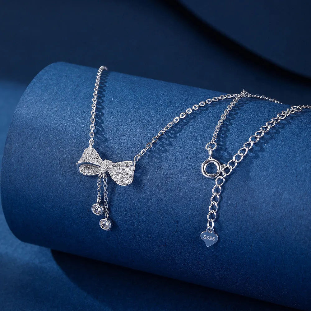 S925 sterling silver bow pendant necklace with adjustable O-ring chain for women