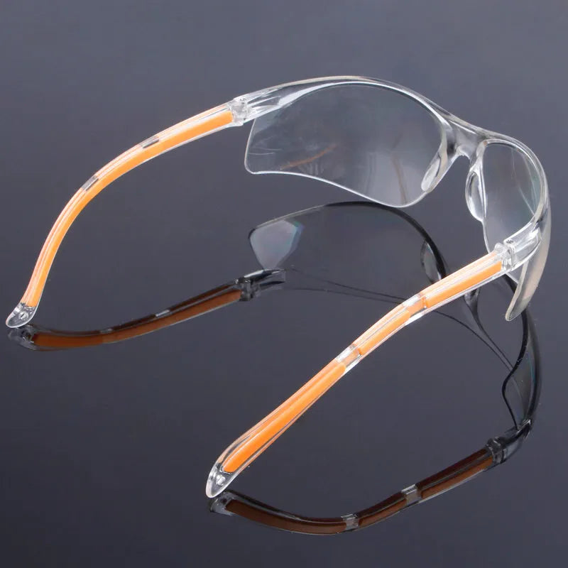 Transparent polycarbonate safety goggles with yellow tint lenses for laboratory and welding work