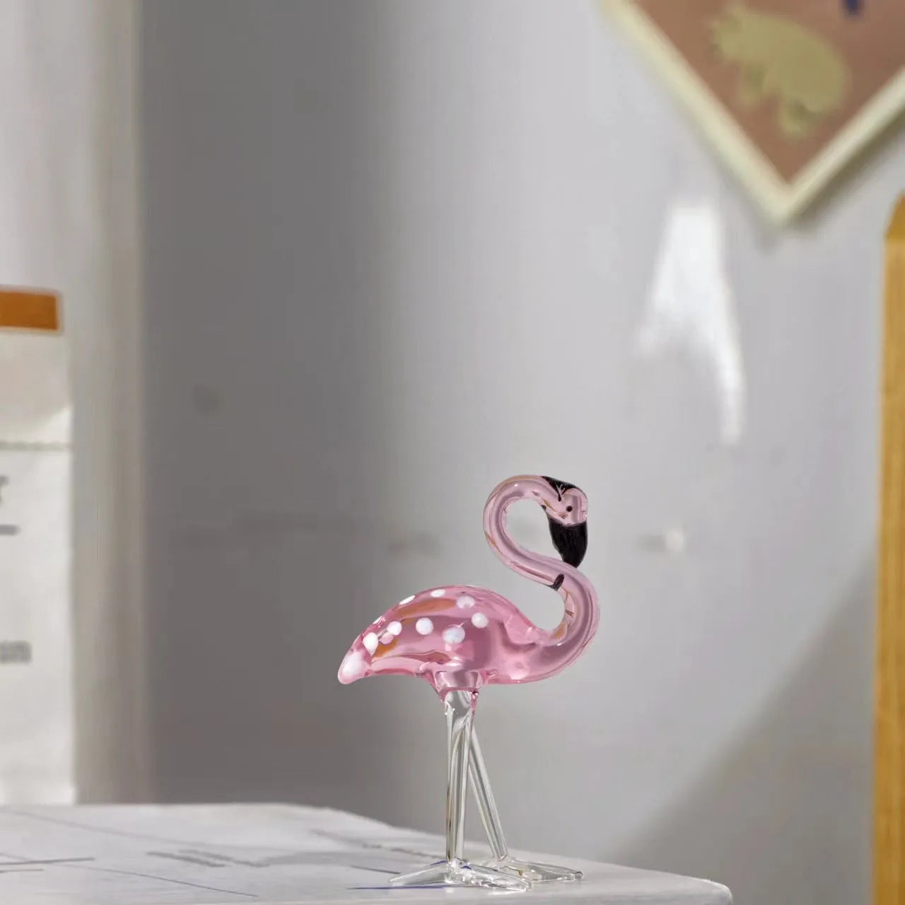 Pink crystal flamingo decorative ornament in modern style on table