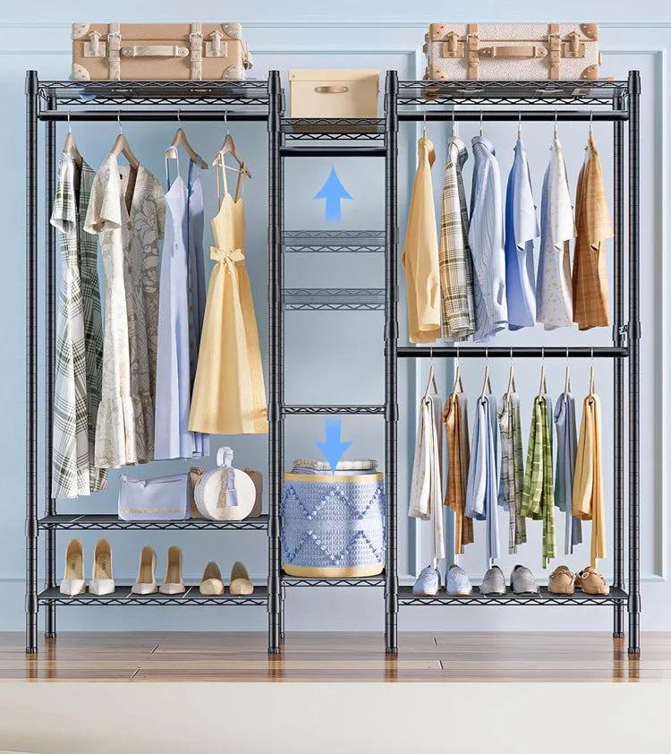 Black floor standing metal clothes storage rack with garments hanging