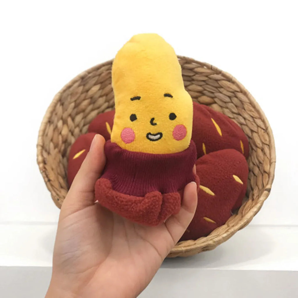Red silicone sweet potato pet puzzle toy with hidden treat compartments for dogs