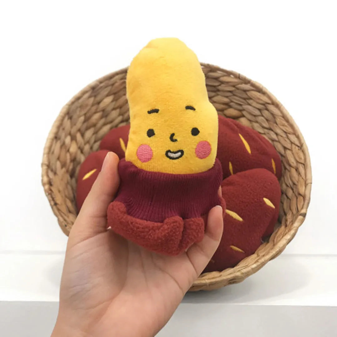 Red silicone sweet potato pet puzzle toy with hidden treat compartments for dogs