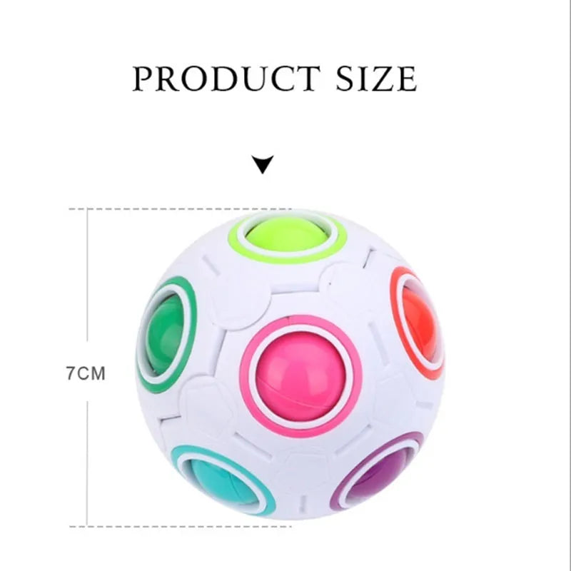 A 5.5 cm diameter rainbow-coloured plastic puzzle ball with a hexagon pattern.