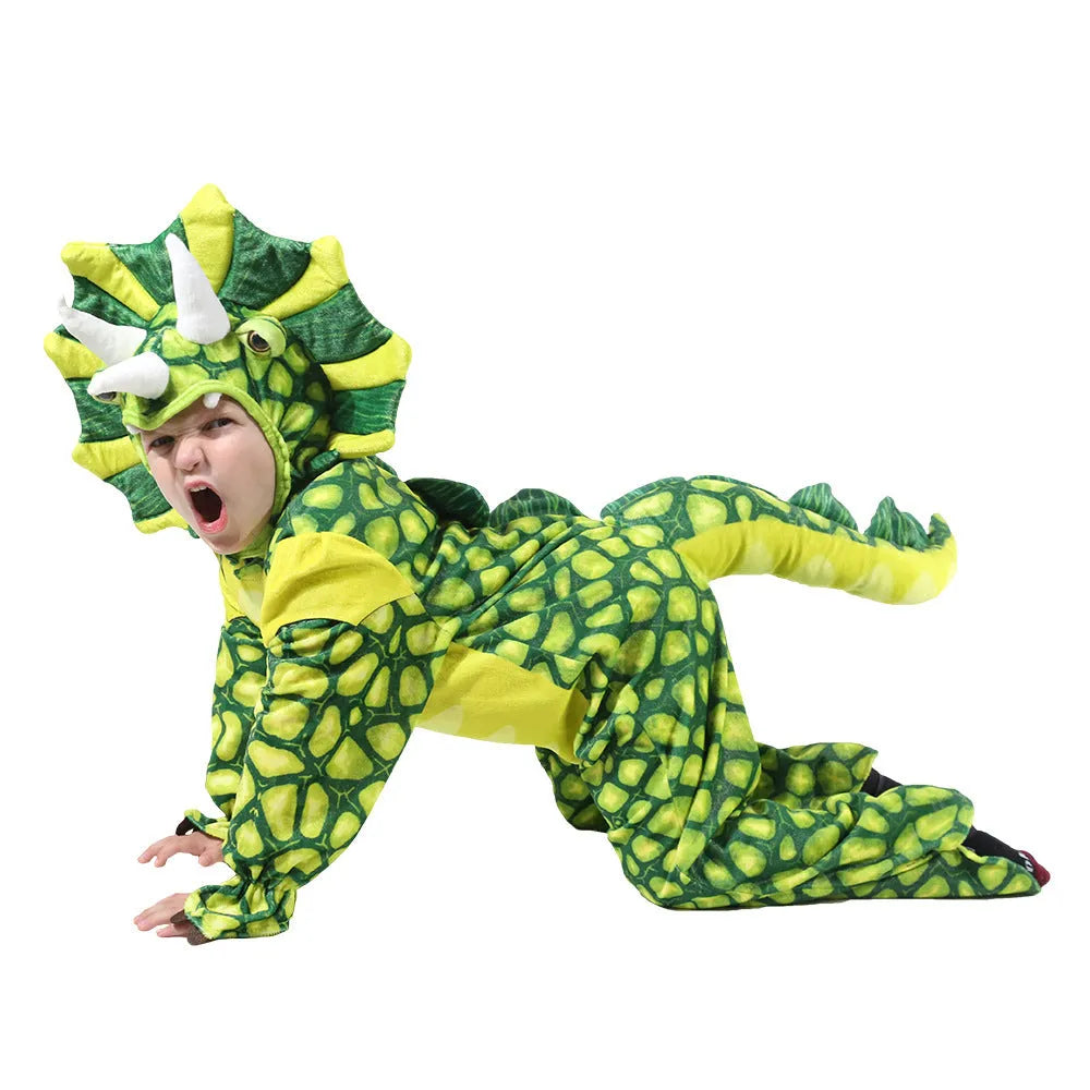 Child wearing a green Jurassic dinosaur Halloween costume with a tail and hood.