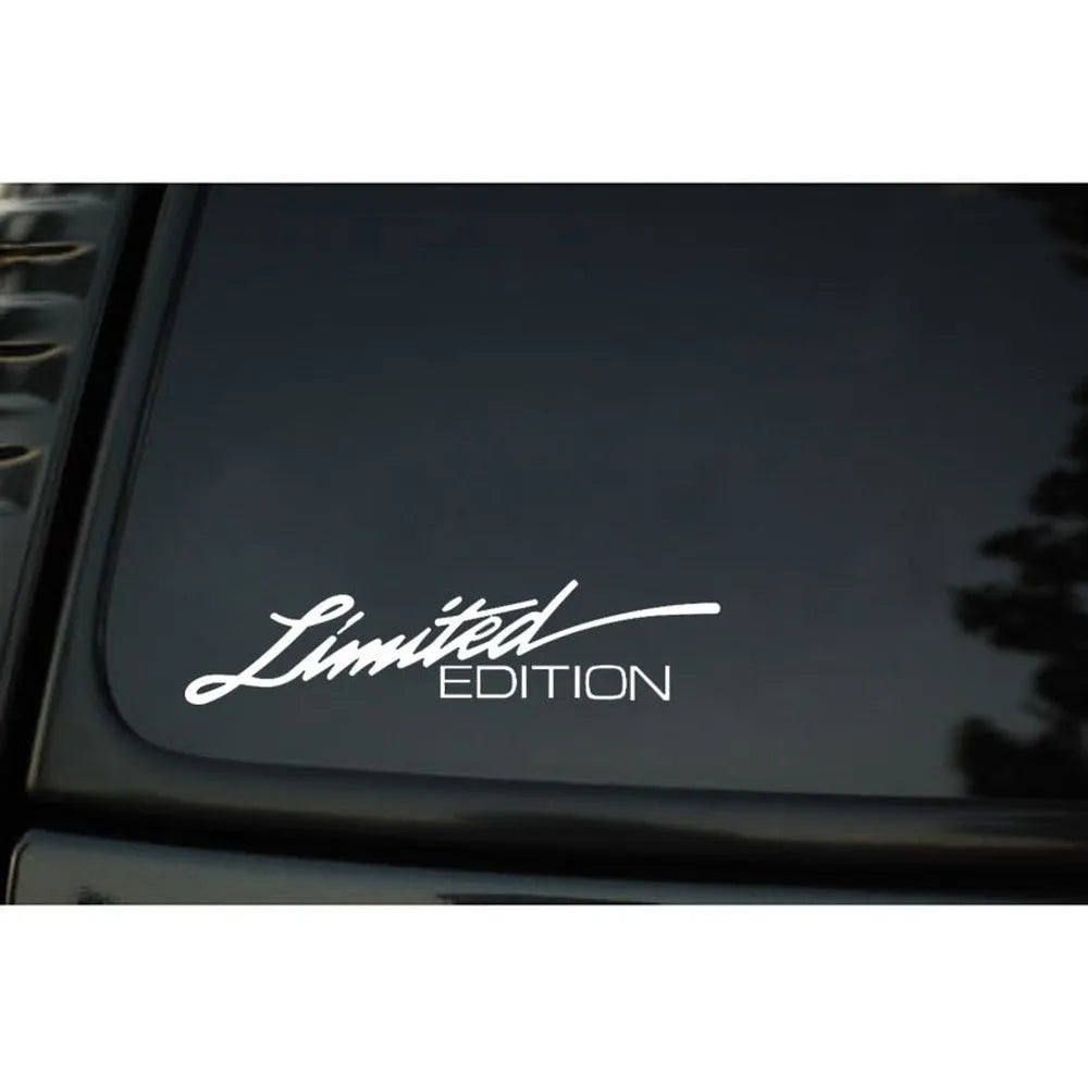 British reflective plastic bumper sticker in black, white, or colourful, showing 16cm by 3.8cm size.