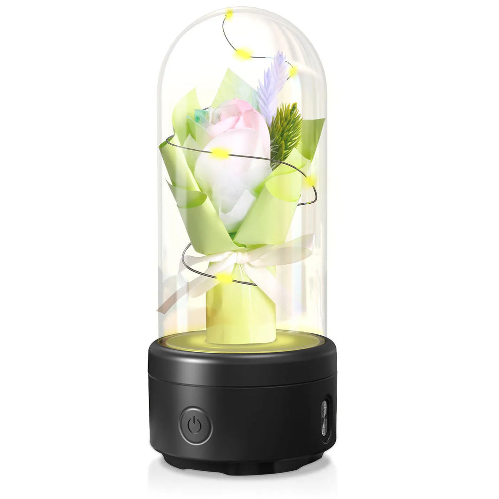 LED bouquet night light with Bluetooth speaker inside a glass cover on a black base.