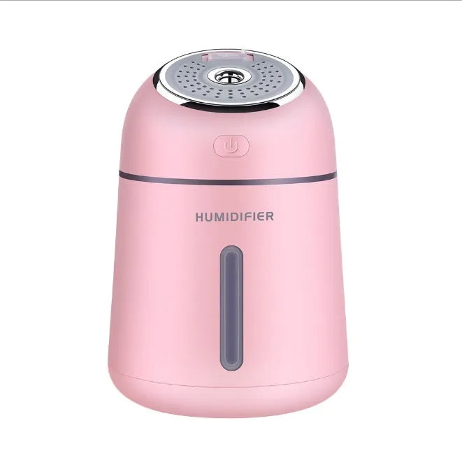 Mini ultrasonic USB humidifier 330ml in blue on desk with fan and LED light