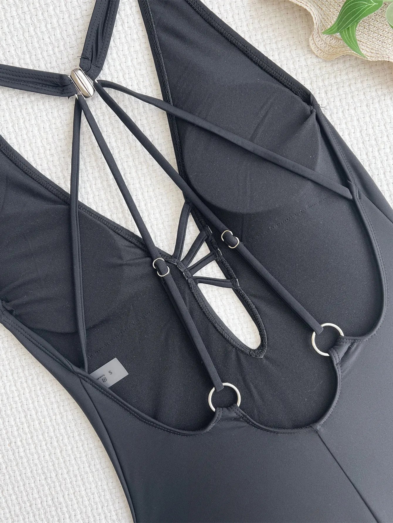 Black solid colour ladies nylon bikini swimsuit on size chart