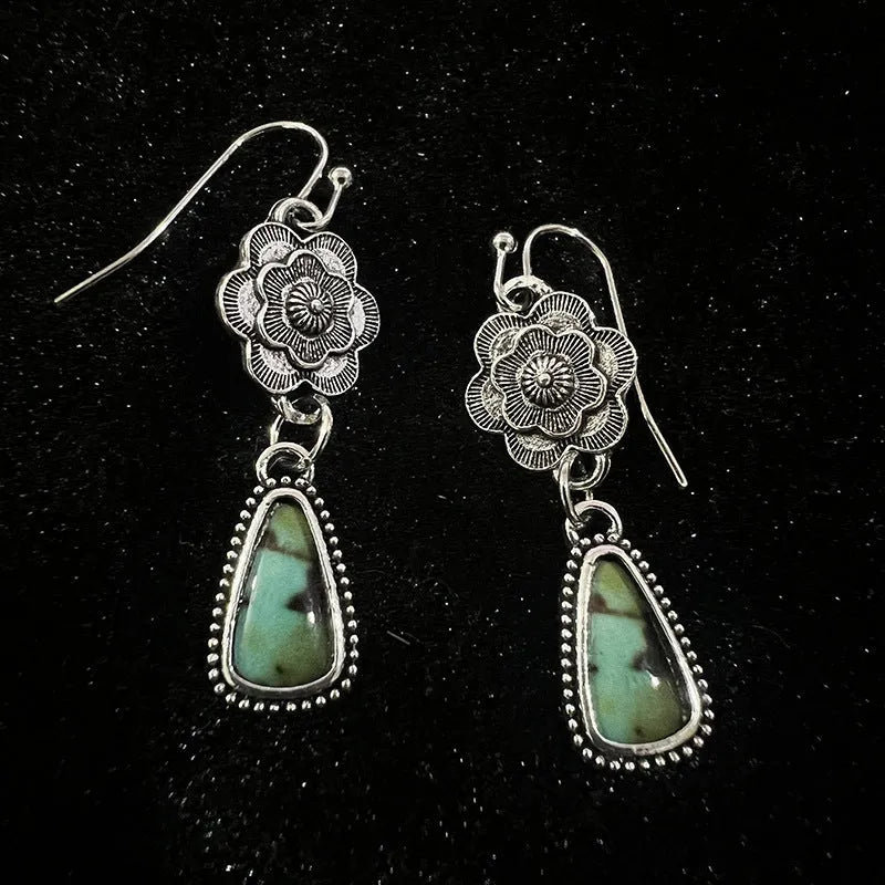 Silver metal carved floral tassel earrings in retro vintage botanical style for women