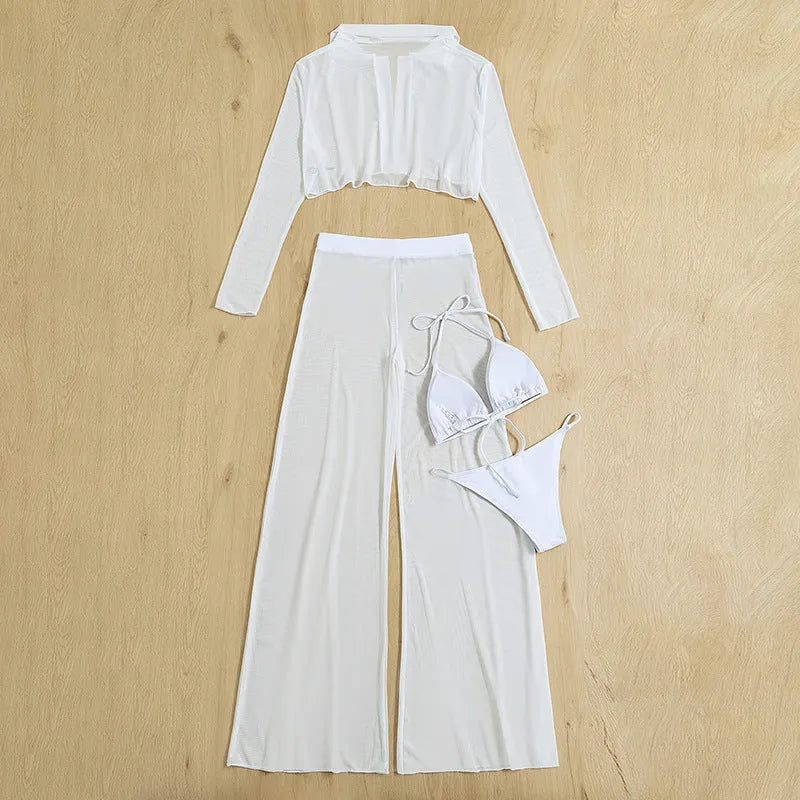 White four-piece women's swimsuit set with high-waist trousers and backless top