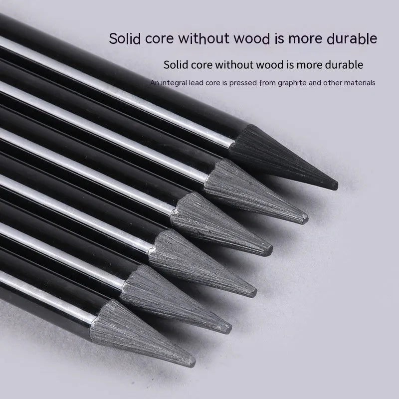 Set of graphite and carbonized wooden pencils on a suction card packaging.