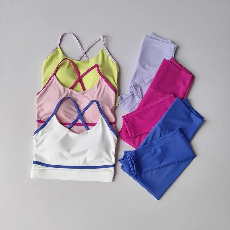 Women's quick drying yoga pants and tank top sportswear set in blue and white colour combination