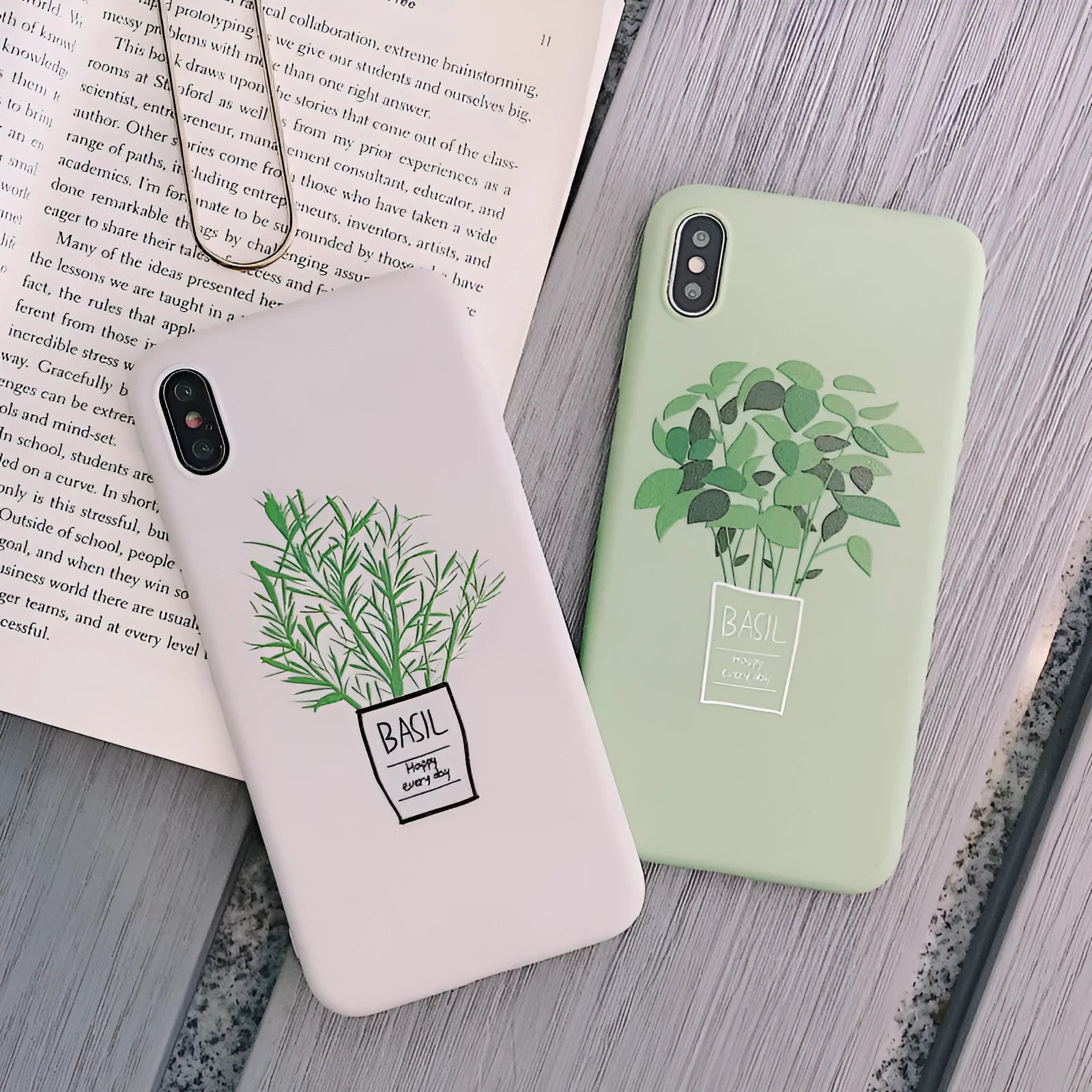 White silicone iPhone case with a detailed green plant pattern on the back, showing full device coverage.