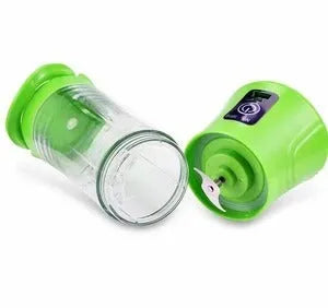 Blue portable handheld USB rechargeable blender with a 400ml clear cup on a table.