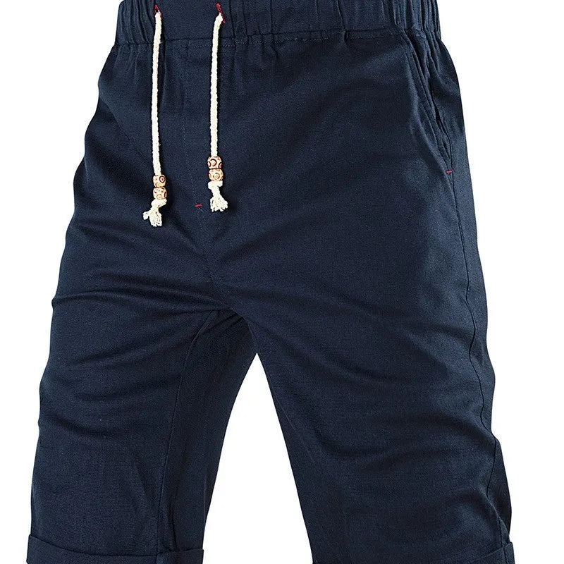 Men's solid colour cotton blend sports shorts with drawstring waistband and zipper pocket