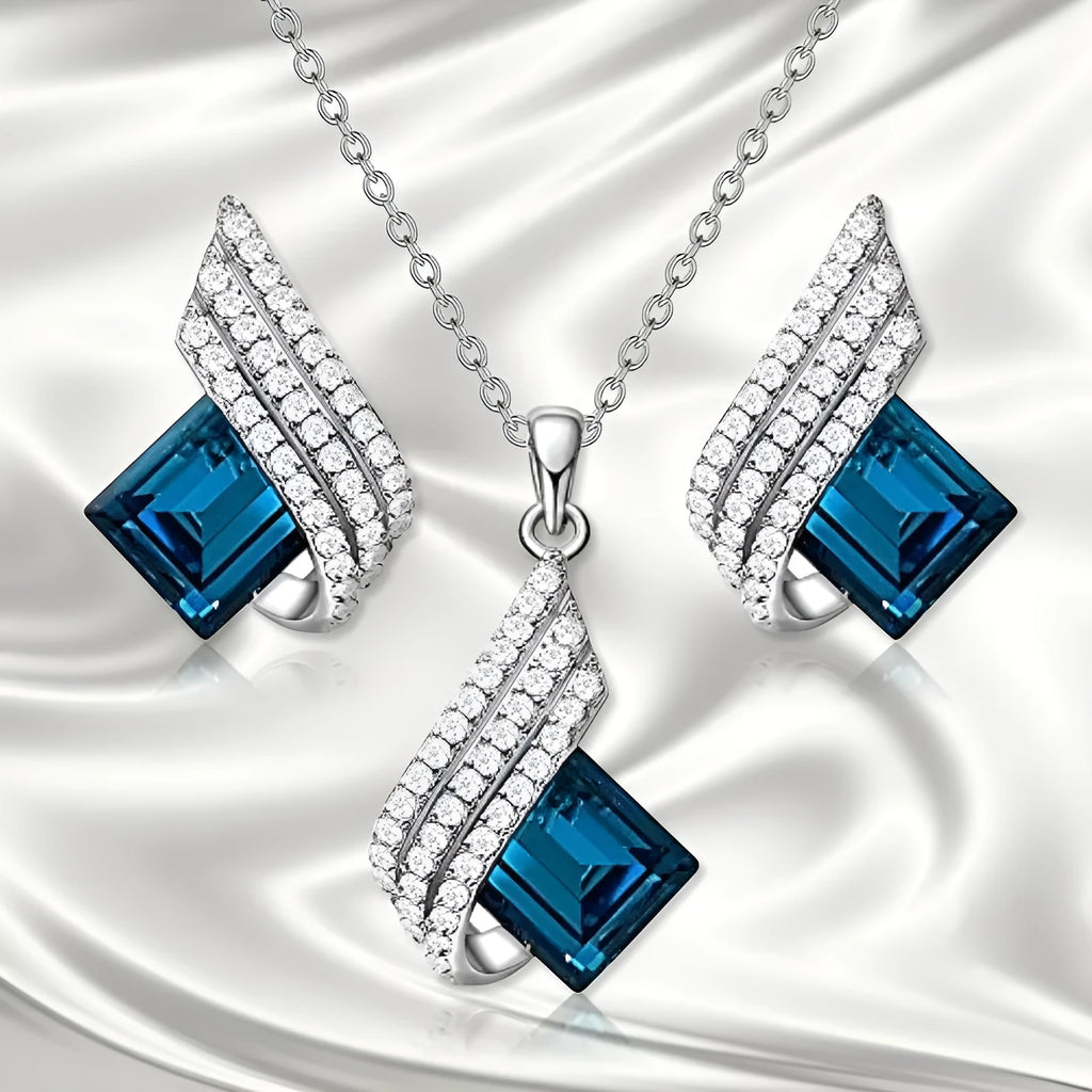 Fashion jewellery set showing alloy pendant necklace with cross chain and matching glass ear studs