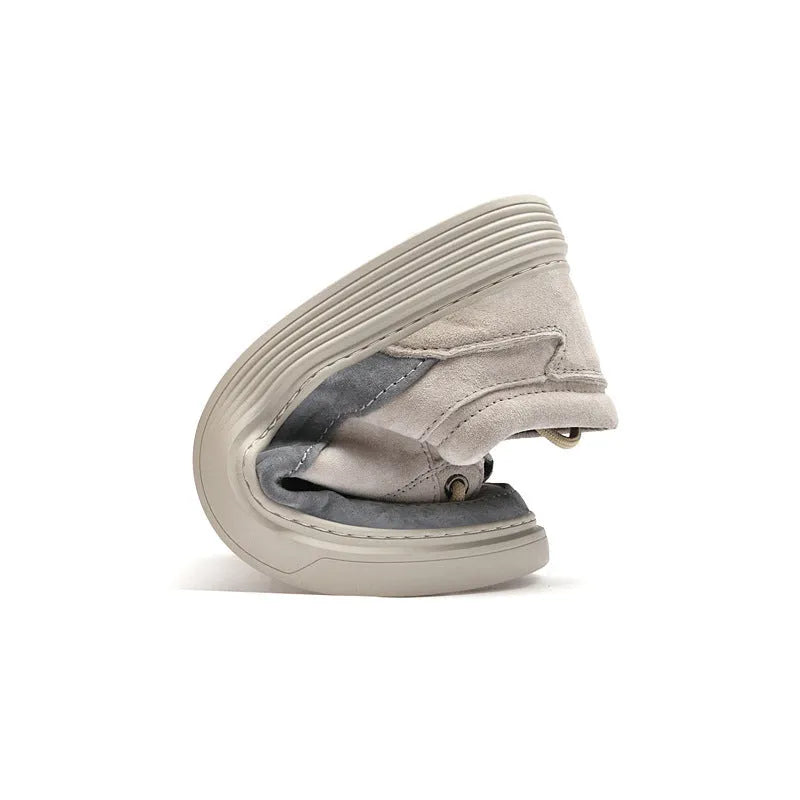 Men's grey casual leather skate shoes with a round toe and front lace-up on a soft rubber sole.