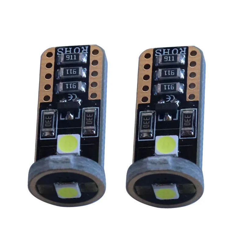 T10 W5W LED car light with blackboard white finish showing compact 23mm by 9mm dimensions