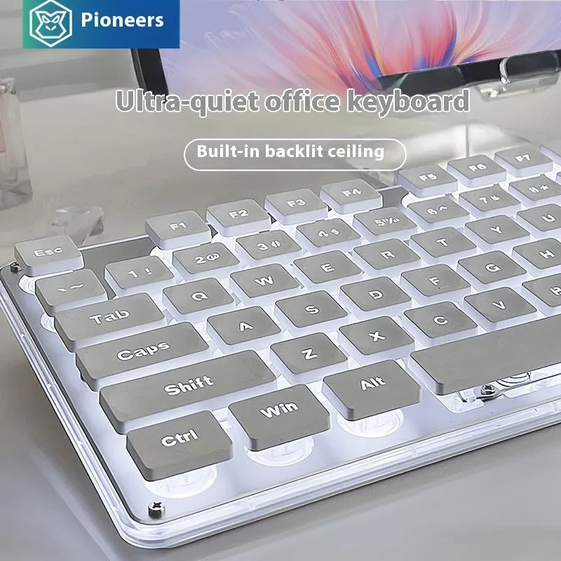 Wired quiet mechanical-feel keyboard with backlight, shown in Metal Black colour with blue illumination