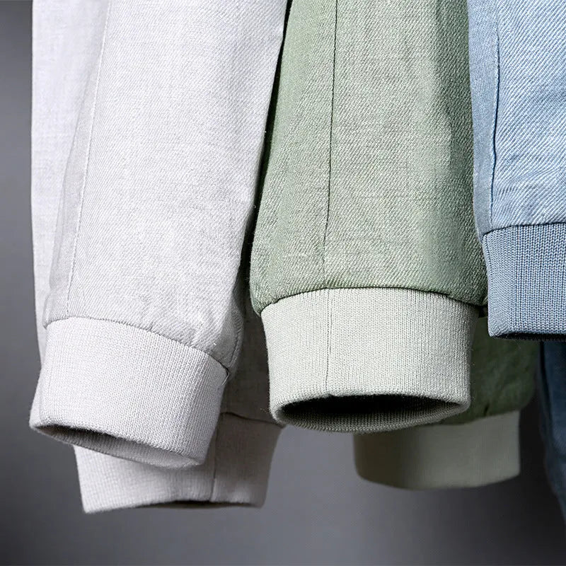 Men's thin heather grey linen jacket on a hanger, showing regular fit and colour block detail.