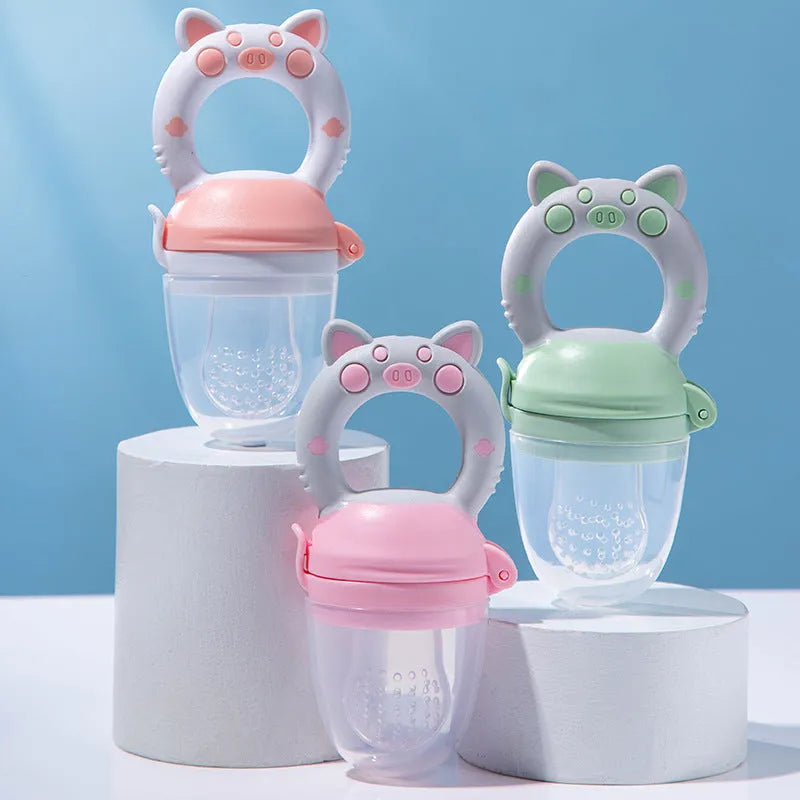 Silicone baby fruit and vegetable teether with handle, round shape, medium-flow nipple, sizes S M L, colour options