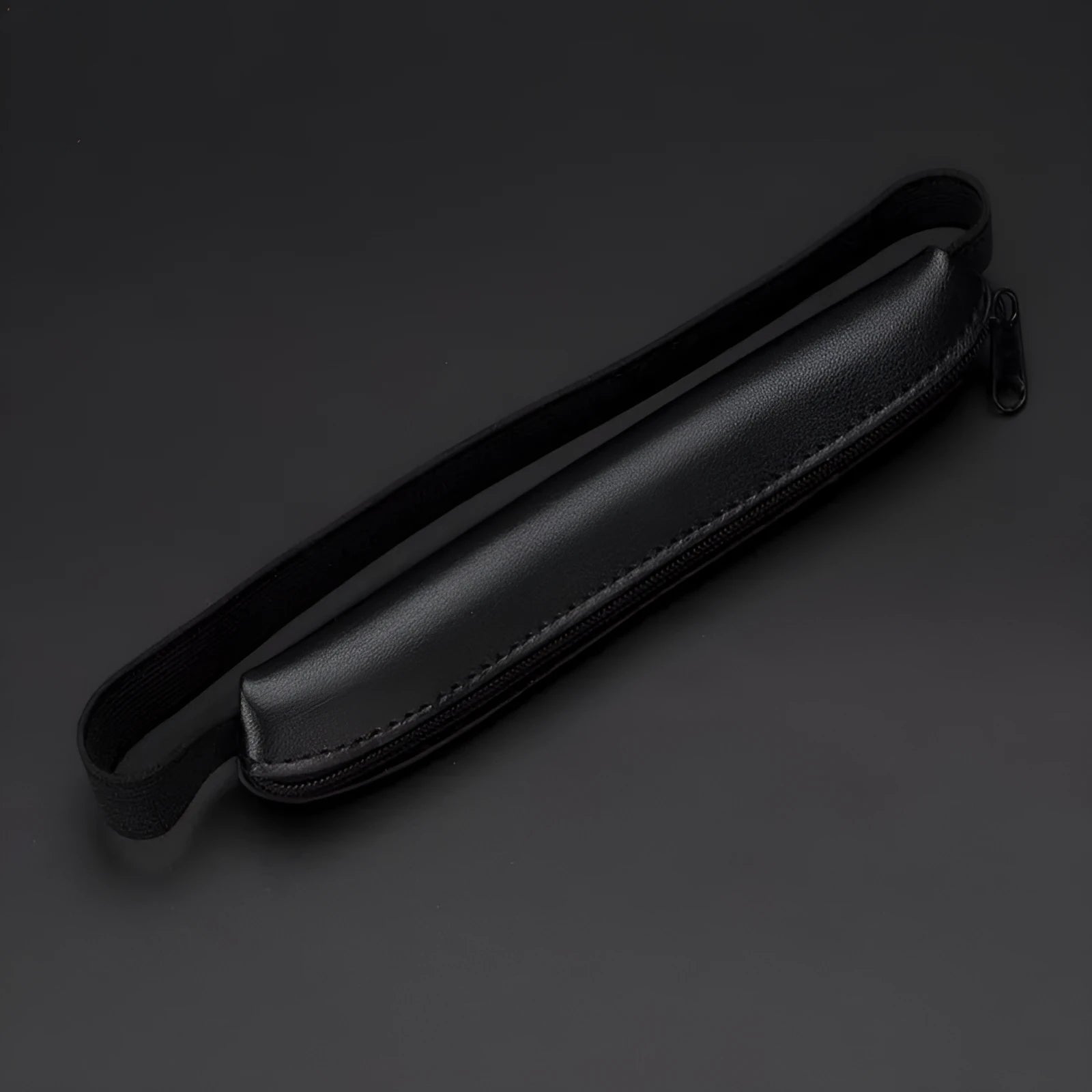 Long PU leather pencil case in beige grey, 16.5cm in length.