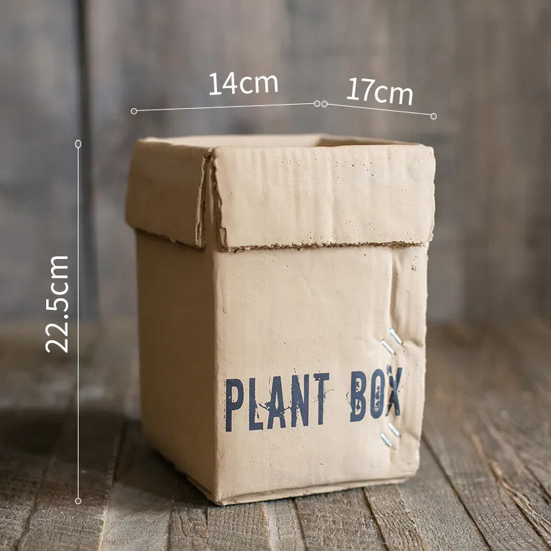 Cement brown paper box flowerpot with drainage holes for indoor planting
