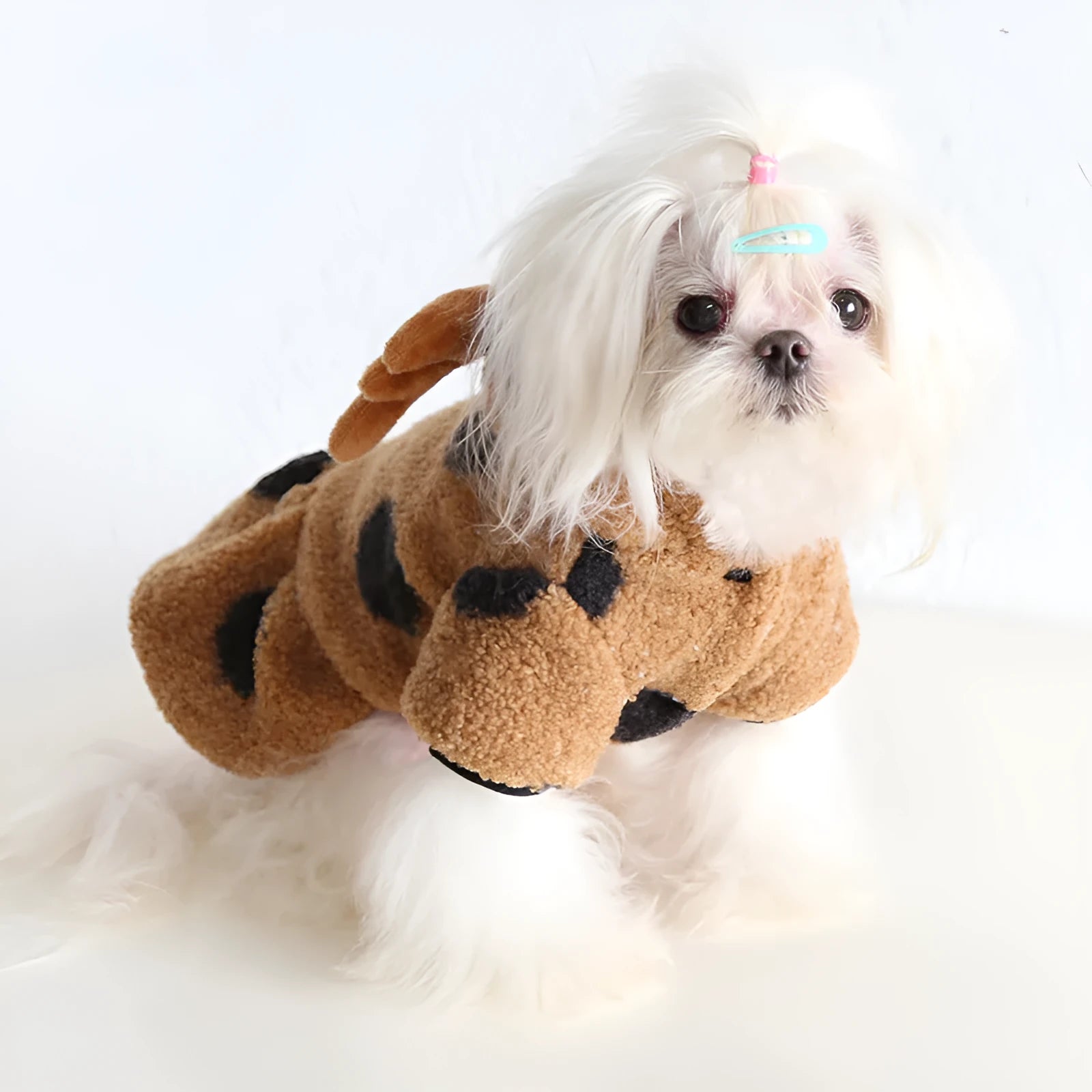 Polka dot pet dog clothes with elk couple design in skirt and four-leg styles on a mannequin.