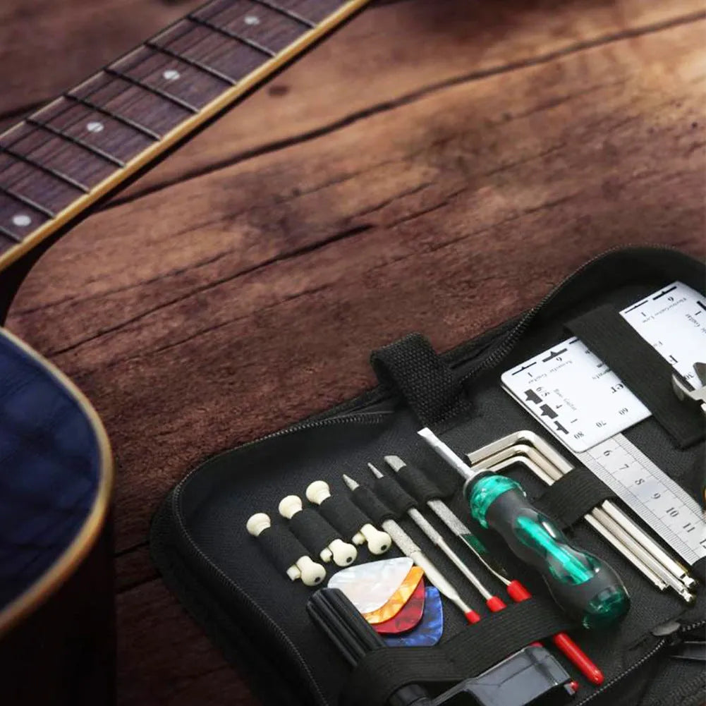 Black plastic case of a guitar repair tool kit for guitar, bass, mandolin, and banjo maintenance.